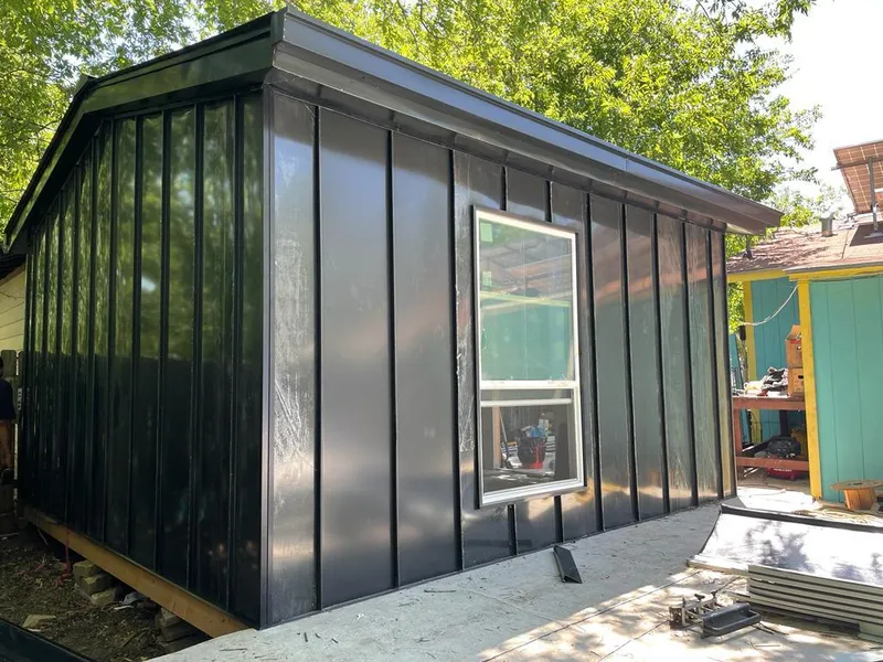 Black standing seam metal wall panels for Roof Inspection in Stevens Point